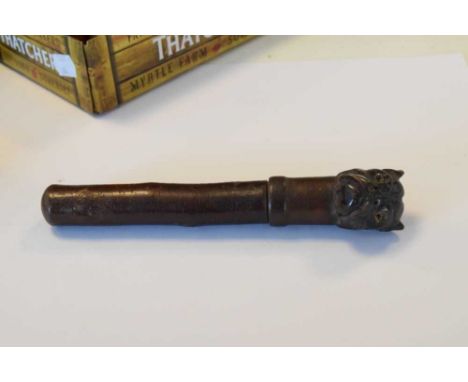 19th Century treen container, of cylindrical form, the push-on cover with dog head finial having glass eyes, 20cm long overal