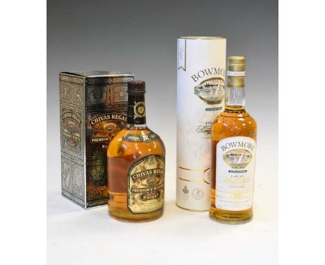 Bottle of Bowmore Islay single malt whisky and a bottle of Chivas Regal 12 years blended Scotch whisky