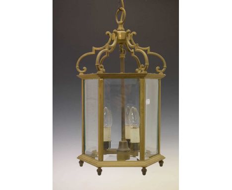 Gilt metal and glazed hexagonal three-light hall lantern, 53cm high