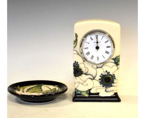 Moorcroft pottery mantel clock with floral decoration on a cream ground, dated 2016, 15.5cm high, and a Moorcroft limited-edi