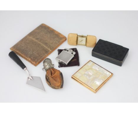 A Laco gilt metal travelling time piece, 12 Jewels, with beige leather cover, a 19th century lacquered papier mache snuff box