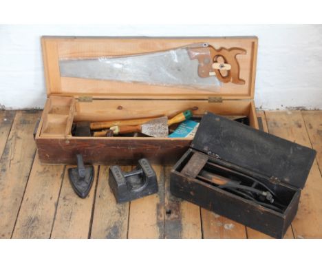 A vintage Dunlop Junior foot pump, an Avery 14lb weight, an iron laundry iron and a selection of tools
