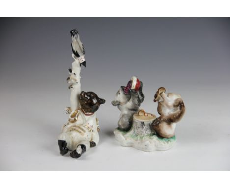 A Russian porcelain 'The General' figure, designed as a bear in uniform below a tree with birds perched, 22.5cm high, with a 