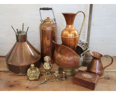 A collection of copper and brass wares, to include a hopper, a coal scuttle, a wash dolly, a 'golly' money box and other item