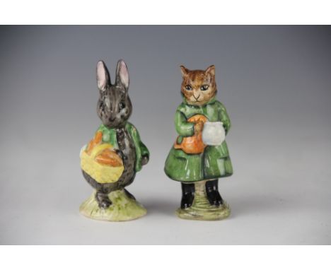 A Beswick Beatrix Potter figure of Simpkin, Frederick Warne & Co Ltd copyright 1975, with a model of Little Black Rabbit, cop