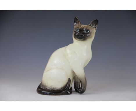 A Beswick model of a siamese cat, no 1882, 24cm, and a Beswick model of an owl, 1046 (2)