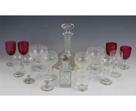 A collection of glass wares, comprising two Stuart crystal glasses with engraved vine detailing, two similar glasses, four cr