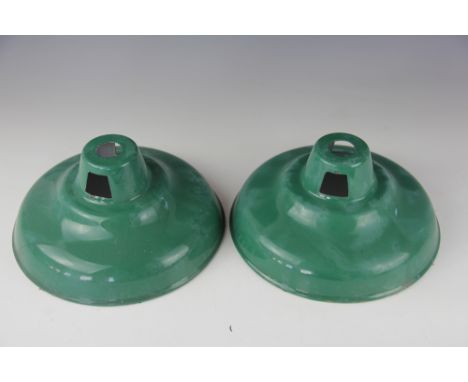 A pair of vintage green enamel ceiling light shades of coolicon type, 26cm diameter