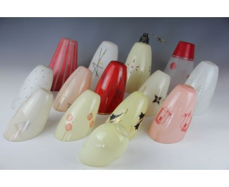 Fourteen 1950's retro lamp/light shades, including a red striped example and a red spotted example, largest 20cm