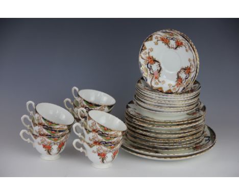 An Edwardian thirty five piece part tea service
