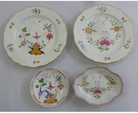 Two Meissen decorative plates and two matching dishes