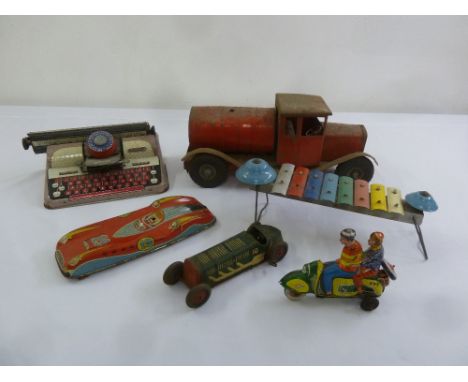 A quantity of playworn tin plate toys to include Mettoy typewriter, a red tanker lorry, two racing cars and a Technofix scoot