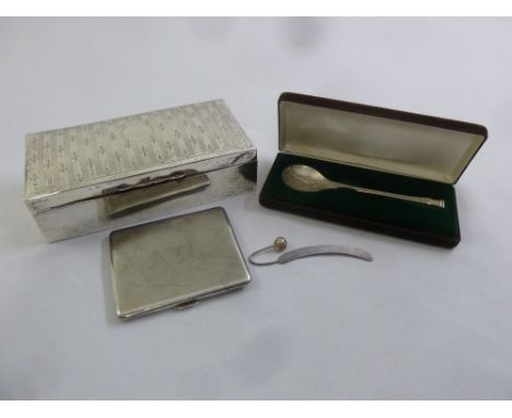 A quantity of silver to include a rectangular silver cigarette box, an engine turned silver cigarette case a cased spoon and 