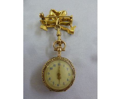 A ladies gold, enamel and diamond brooch watch tested 18ct