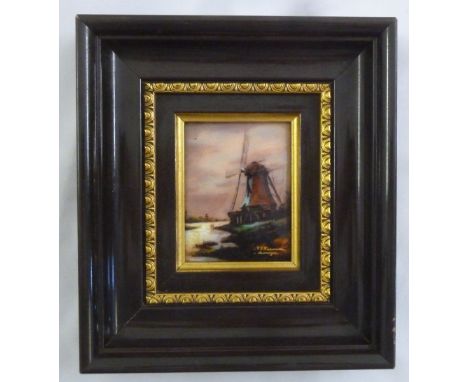 A framed polychromatic Limoges enamel, of a windmill, indistinctly signed bottom right, 8 x 6.5cm