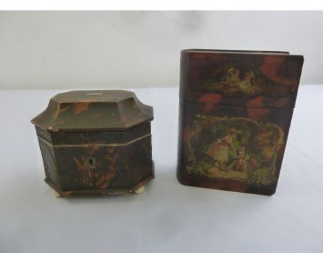 A 19th century tortoiseshell hexagonal tea caddy carved with architectural forms with raised hinged cover on four ivory ball 