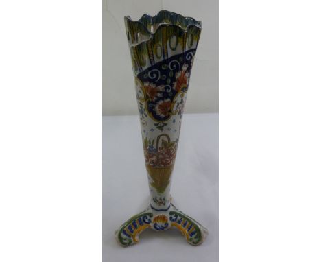 Gien Faience ceramic stem vase decorated with flowers and scrolls on triform base