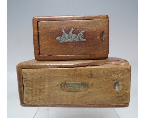 A SMALL WOODEN SNUFF BOX, with white metal panel depicting game two birds in undergrowth and initialled inset panel to unders