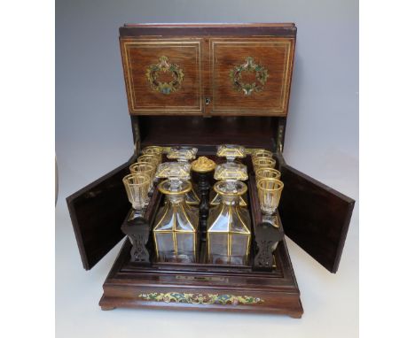 A VICTORIAN ROSEWOOD INLAID TABLE TOP DRINKS CABINET, the cabinet with inlaid brass detail and coloured enamel panels, the ca