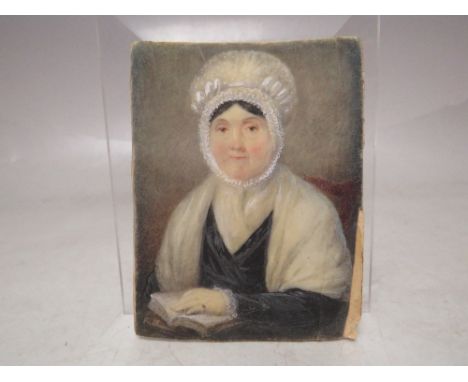(XIX). A portrait miniature on ivory of a lady wearing a lace bonnet, unsigned, unframed, 8.5 x 6.5 cm A/F