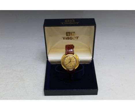 A VINTAGE TISSOT AUTOMATIC SEASTAR SEVEN WRIST WATCH, Dia 4 cm together with a Tissot box
