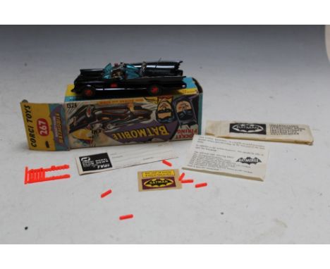 A CORGI TOYS BOXED 267 ROCKET FIRING BATMOBILE, together with inner packet and contents including rockets and owners badge, W