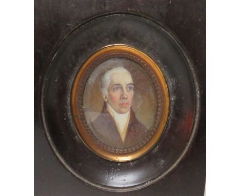 (XVIII-XIX). An oval portrait miniature on ivory of a gentleman with white stock, unsigned, framed and glazed, 5.5 x 4.5 cm