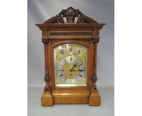 A LARGE TRIPLE FUSEE MUSICAL TABLE CLOCK RETAILED BY GOLDSMITHS COMPANY - 112 REGENT STREET, LONDON, the mahogany case of arc