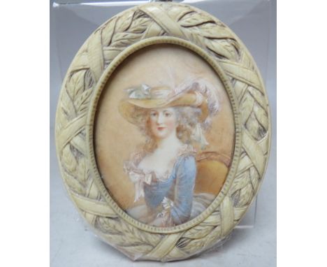 (XIX). An oval portrait miniature on ivory of a young woman wearing a large hat, unsigned, framed in an ivory style decorativ