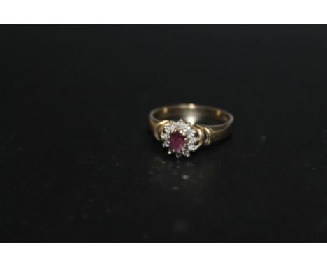 A HALLMARKED 9 CARAT GOLD RUBY CLUSTER RING, approx weight 2.4g, ring size O