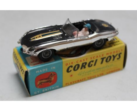 A CORGI TOYS BOXED 312 'E' TYPE JAGUAR COMPETITION MODEL, in plated finish complete with driver, W 10 cm