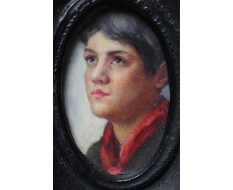 (XX). An oval portrait miniature study of a young boy, unsigned, framed and glazed, 6 x 3.5 cm
