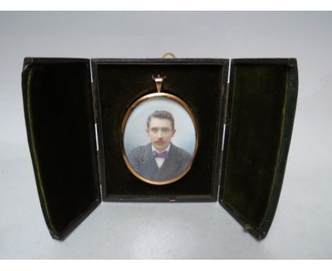 (XIX-XX). Oval portrait miniature on ivory, head and shoulder portrait study of a gentleman with moustache and wearing a bow 