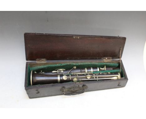 AN ANTIQUE CASED MULTI SECTION CLARINET, case W 38 cm