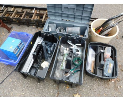A collection of toolboxes, small tools, saws, etc. (contents of 4 boxes, 1 bucket and a toolbox) 