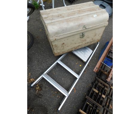 An aluminium step ladder, together with a metal tin trunk. (2)