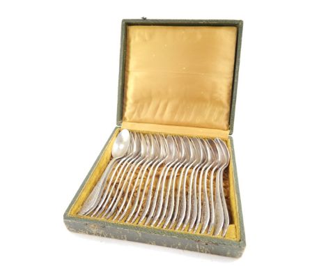 An early 20thC continental fork and spoon set, with shaped raised handles and plain bowls, marked in fitted case, settings fo