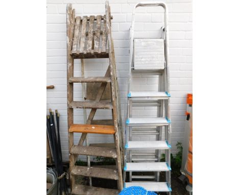 A group of step ladders, comprising two aluminium, one wooden and another metal and wood. (4)