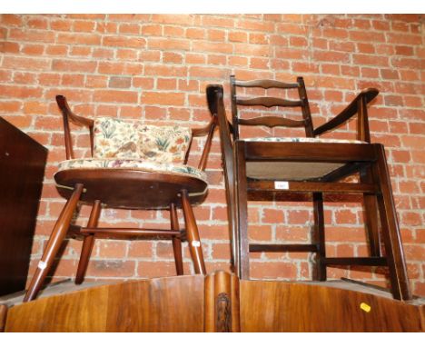 An Ercol cow horn armchair, together with an Ercol dining chair. (2)