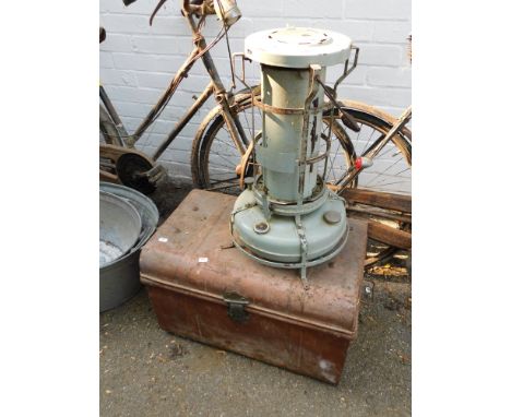 An Aladdin Blue Flame heater, 54cm high, together with a tin trunk, 59cm wide.  (2)