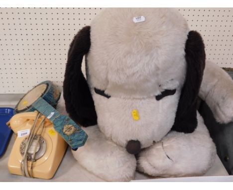 A large Snoopy soft toy, cream telephone, and a Roy Smeck ukulele, signed to drum. 