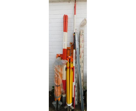 A selection of surveyors tools, to include optical level and theodolite stand.