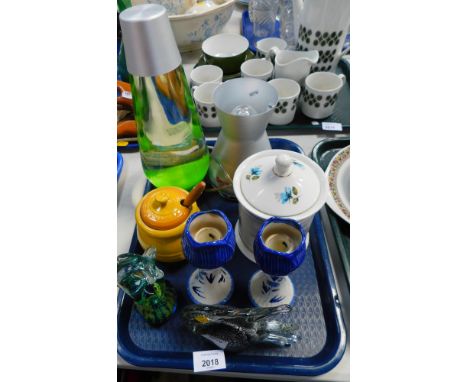 Two Medina glass ornaments, to include a seahorse and a fish, a Le Creuset honey pot and honey dipper, Mathmos lava lamp, etc
