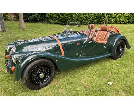 A 2011 Morgan 4/4 W12 V3 two seater Roadster in dark green with tan interiorRegistration CJ13 (currently on private plate - t