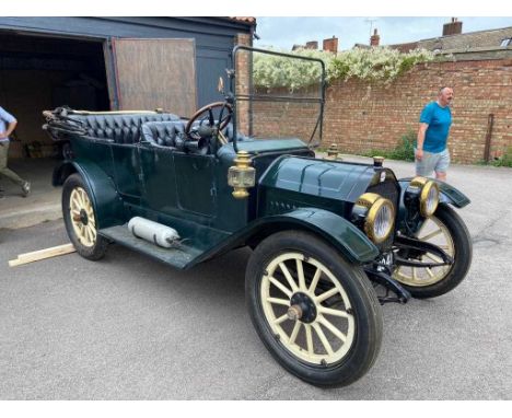 A 1913 Empire Little Aristocrat four-door convertible saloon in green.Registration No. SV 40413000ccChassis No. 316865Engine 