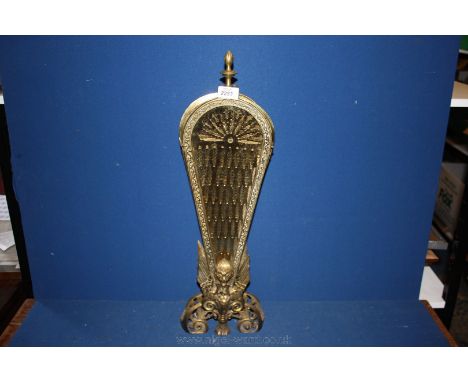 A brass Firescreen