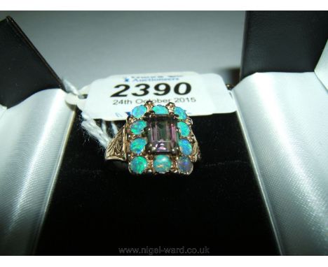 A Gold, amethyst and Opal dress Ring