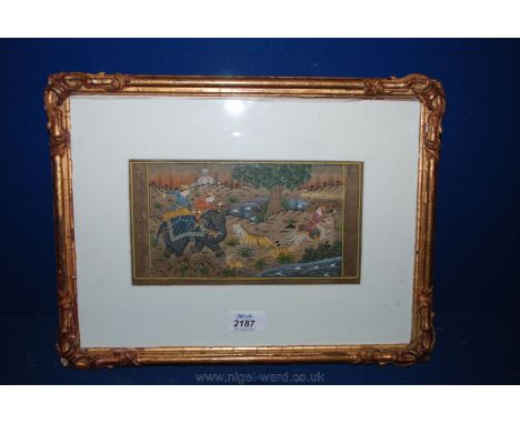 A framed and mounted Print of an Indian Tiger Hunt, 9 1/4'' x 5''.