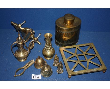 A Brass Tea Caddy, trivet, door knocker and various other brass items.