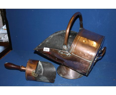 A copper Coal Helmet and Shovel